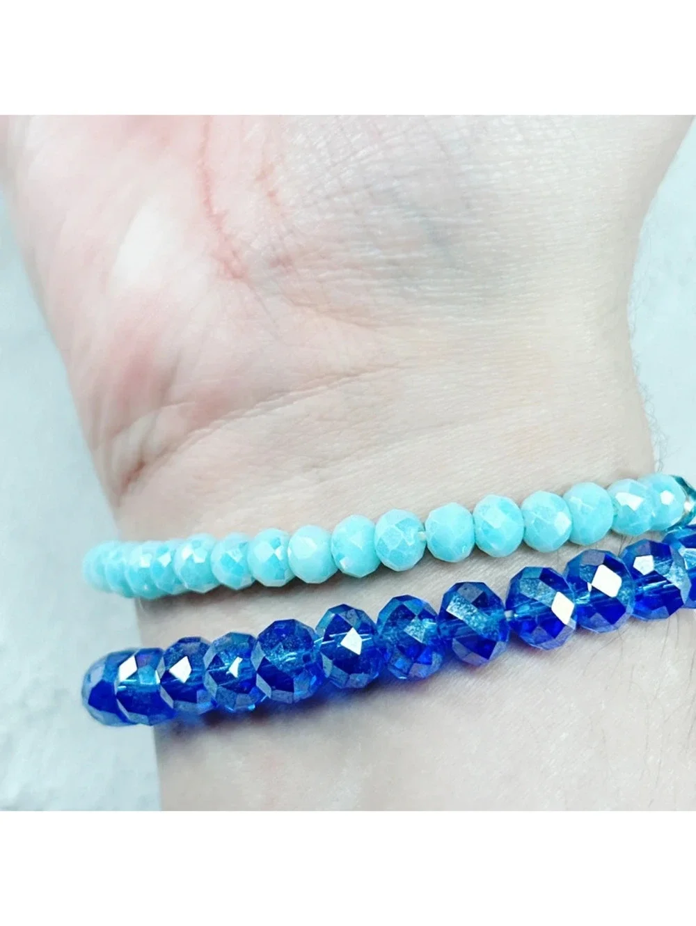 337u. Blue Stretch Glass Bracelets